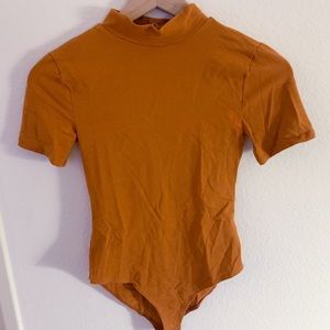 Orange mock neck bodysuit
